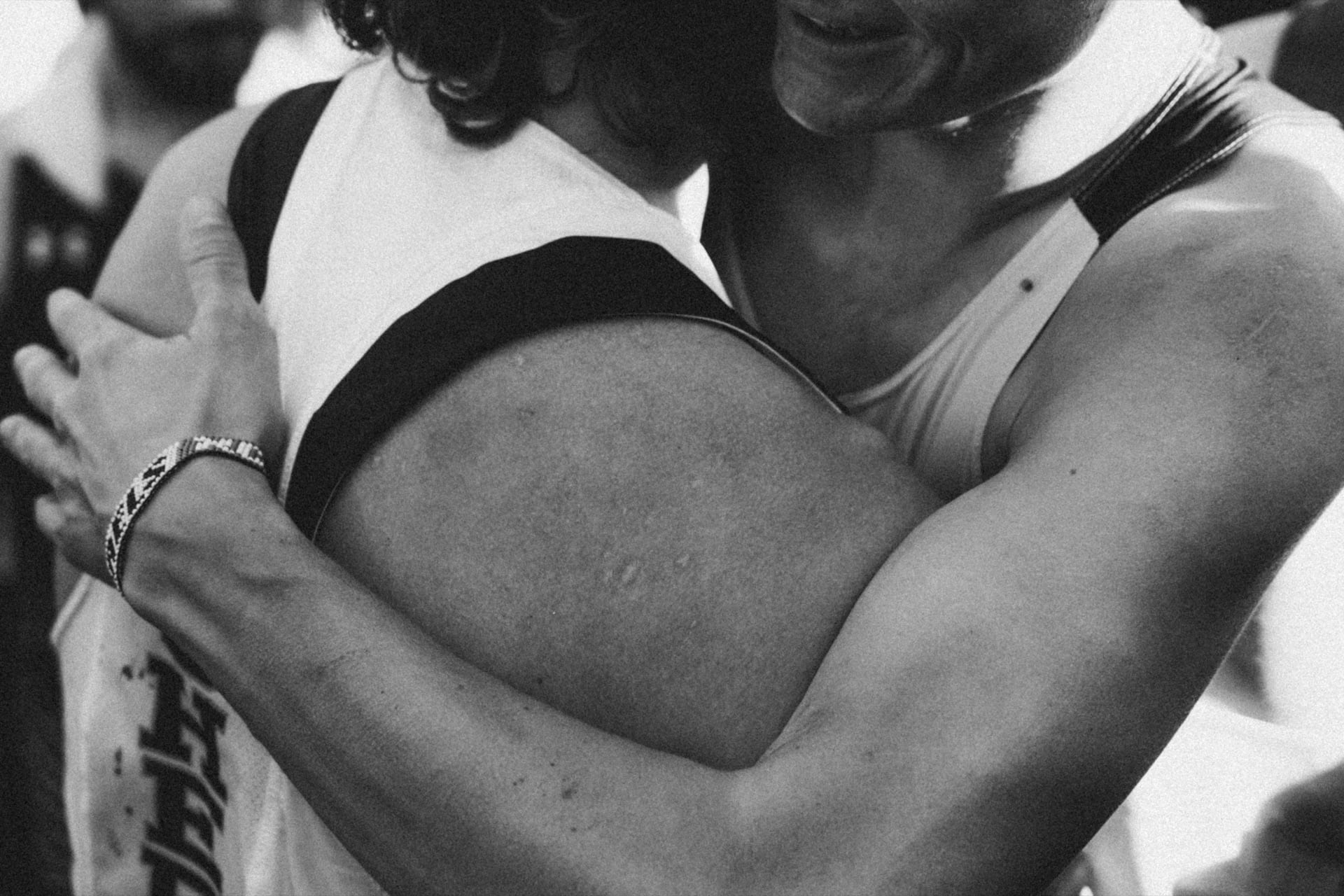 Athletes hugging after the finish line